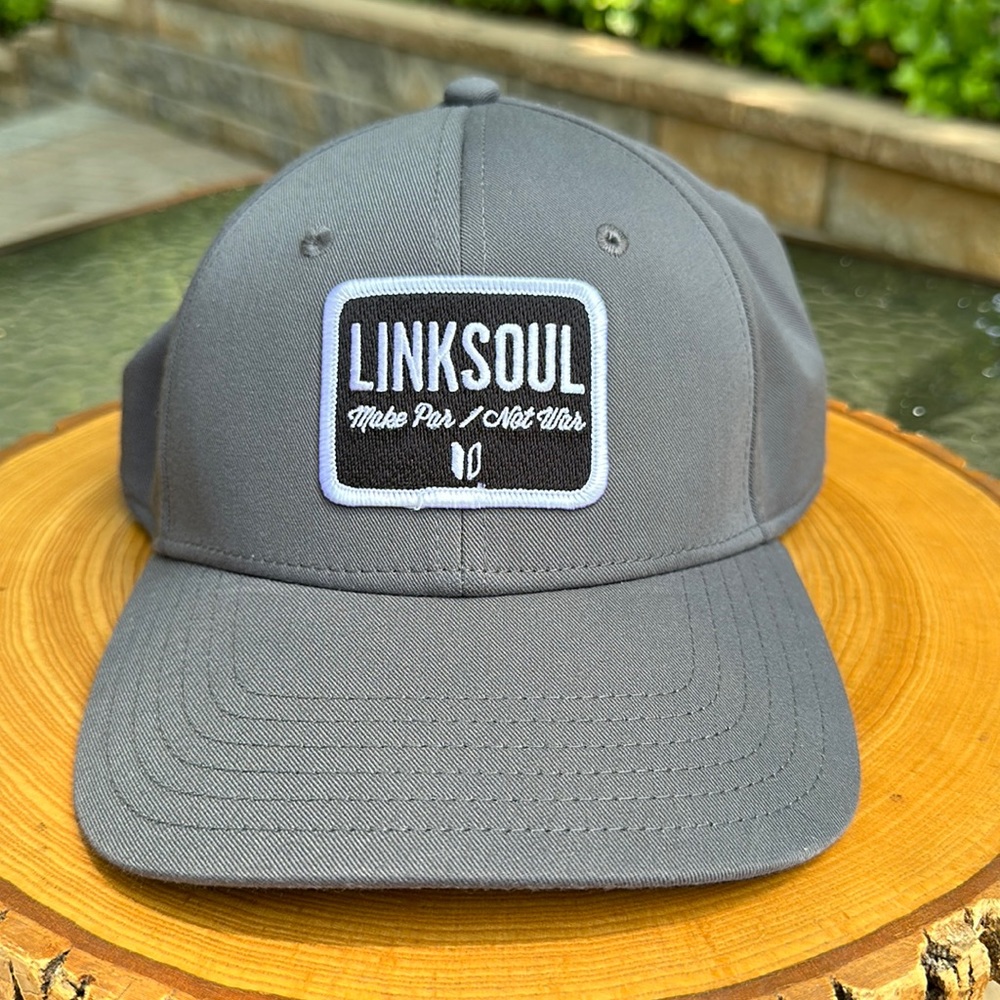 Linksoul Make Par Not War Hat Gray S/M With Flex Band in good condition.